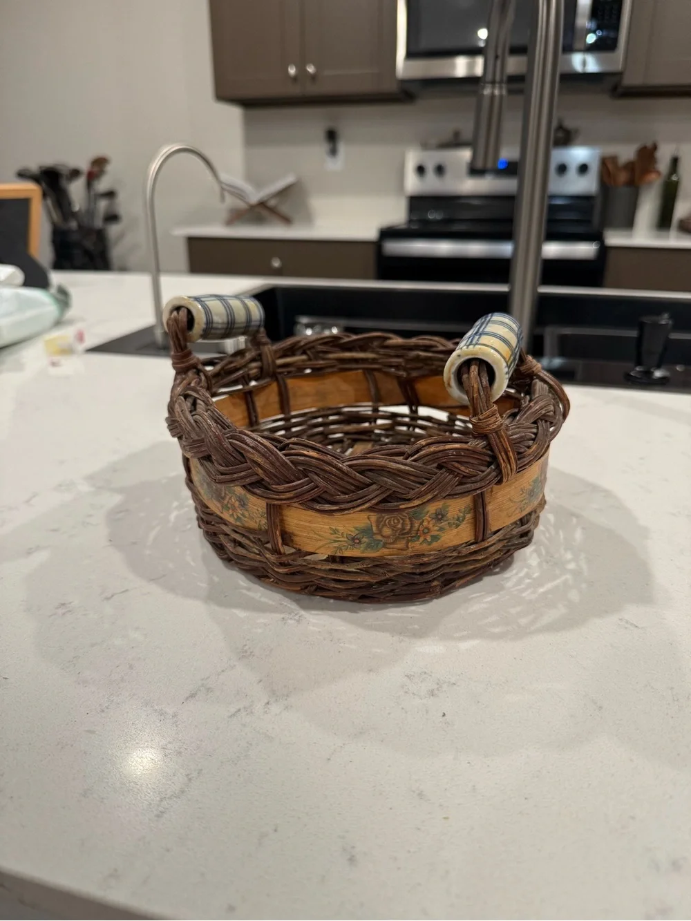 Vintage Wicker Basket with Yellow Floral Accent and Ceramic Handles